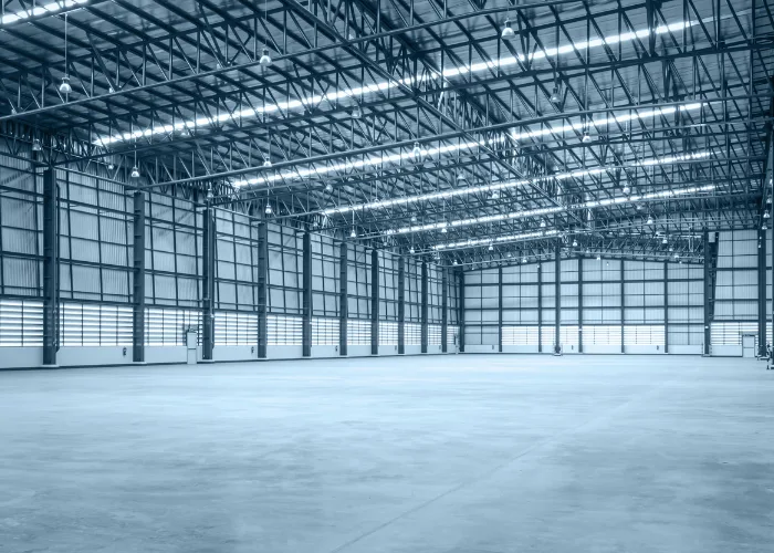Empty, clean warehouse interior with racking space prepared for bonded storage and secure logistics warehousing.